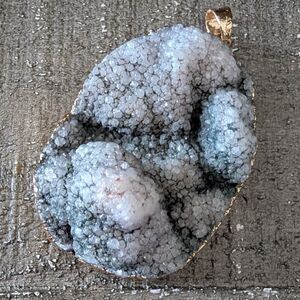 Sparkling Geode Pendant with Gold Trim